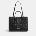 Coach-hand bag