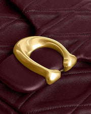 Coach Quilted C-Closure Bag