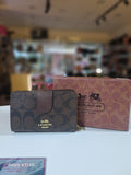 Coach - brown