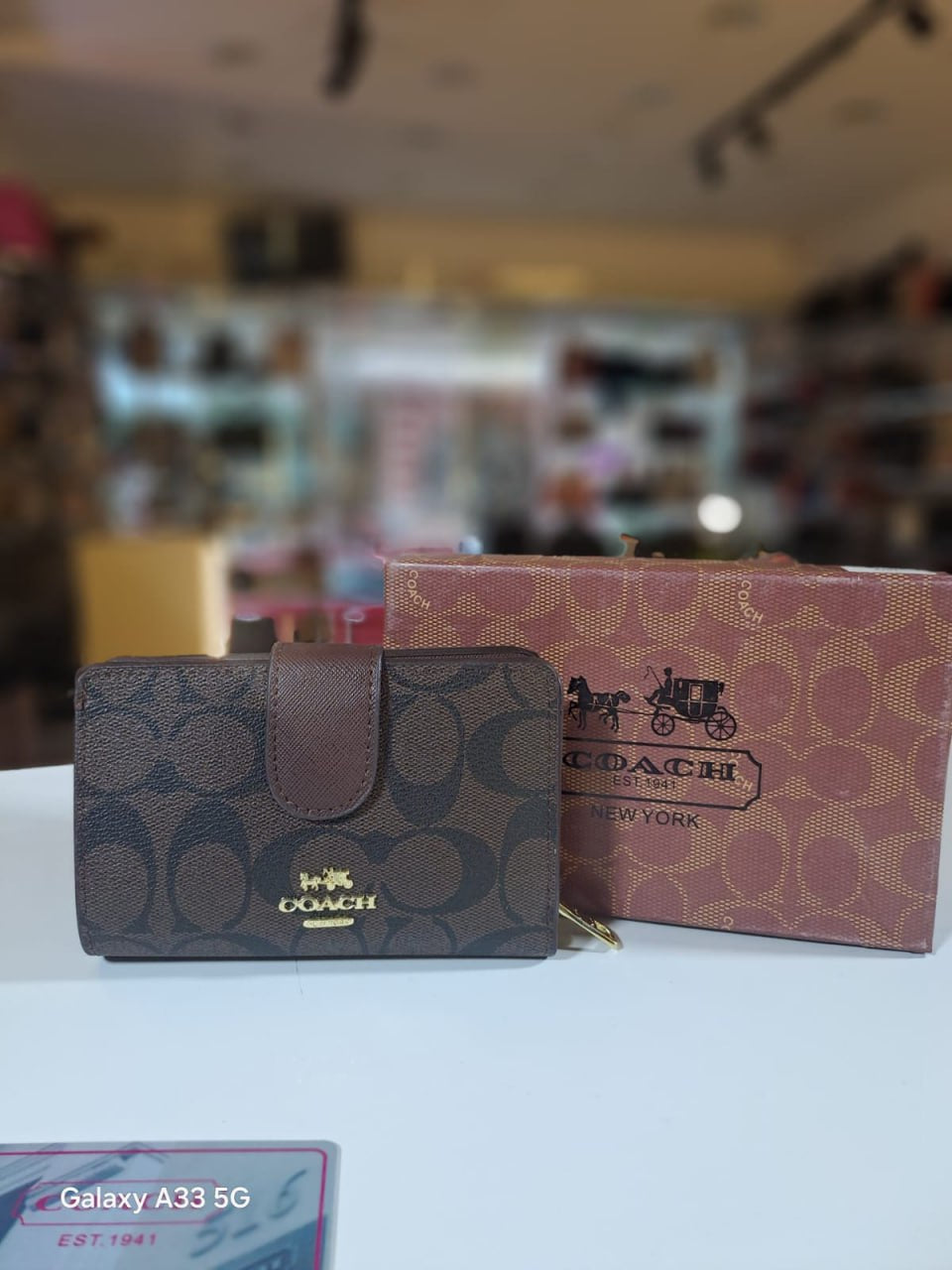 Coach - brown