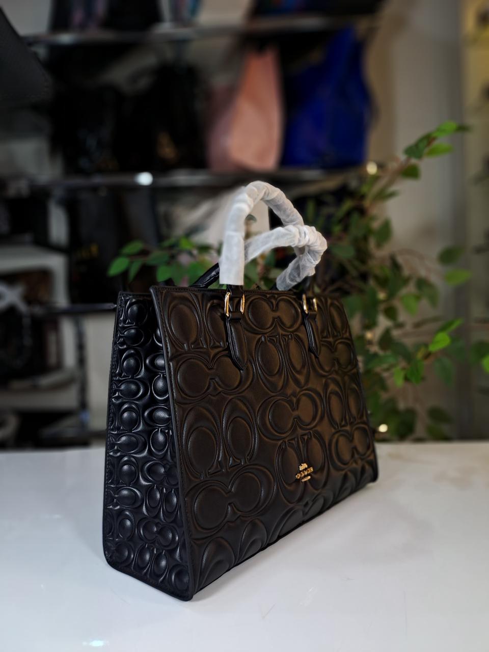 Coach-hand bag